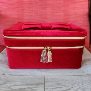 NWOT Estee Luader Red Bow and Gold Cosmetic Bag